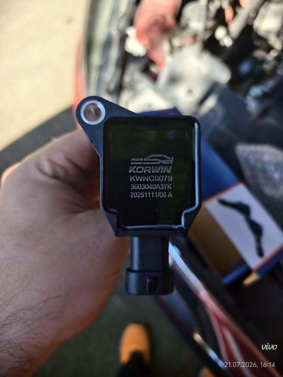 Ignition coil with black plastic body and mounting flange, engraved KORWIN, KWNC0079, 3603040A37K and date code 20251111/06 A