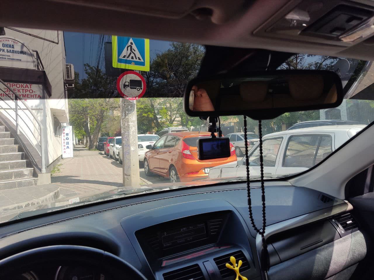 Tint strip mounted, final view minimizing visibility obstruction